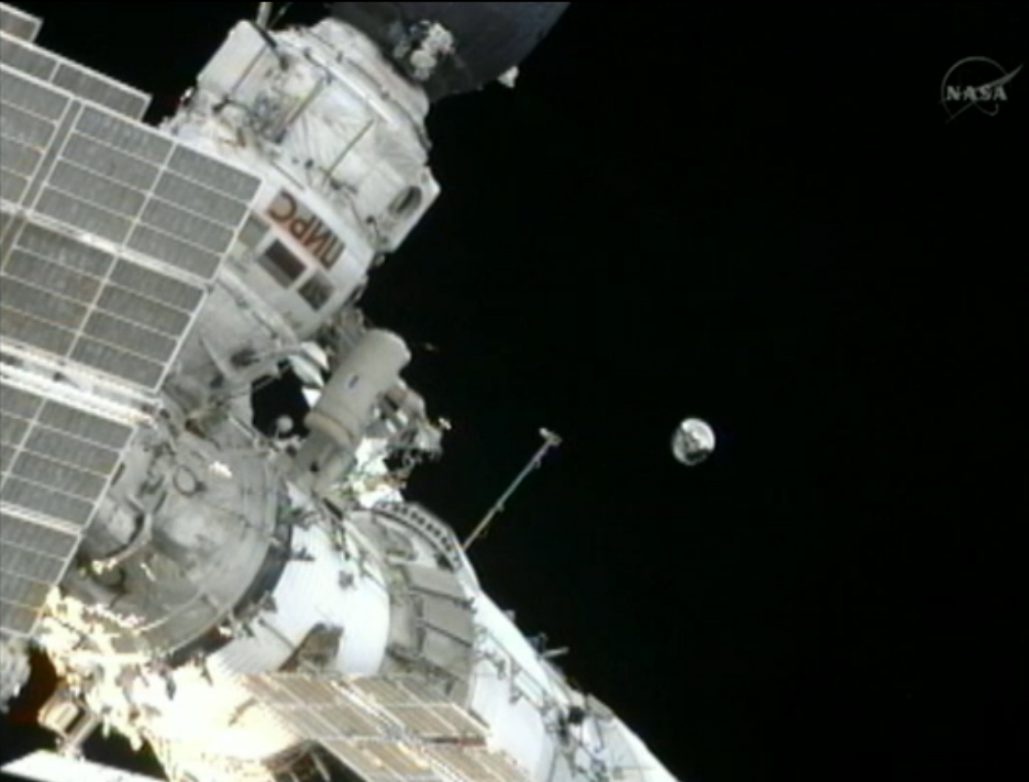 Space Station Cosmonauts Toss Satellite Overboard in Spacewalk